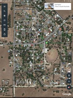 an aerial view of a small town in the desert