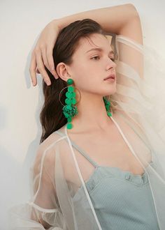 Be bold and make a statement with our Green Hoop Disc Drop Earrings! These striking earrings feature a big hoop design with a disc drop, adding a unique touch to any outfit. Perfect for confident women who want to add a daring touch to their style. 5 6/8" (14.5cm) drop 2 3/8" (6cm) width Post back Alloy, plastic Women's drop earrings Item #452802 Evening Look, Sequin Design, Confident Woman, Mini Shirt Dress, Stunning Earrings, Office Casual, Tassel Earrings, Black Maxi Dress, Crochet Lace