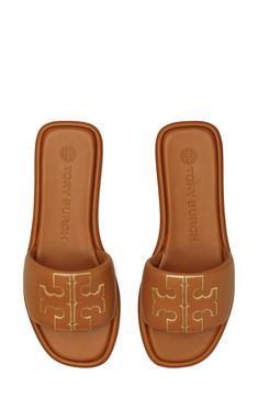 A sleek leather slide accented by Tory's signature double-T logo is ready to upgrade your warm-weather style. Leather upper and lining/rubber sole Imported Linen Joggers, Miller Sandal, Tory Burch Sandals, Navy Linen, Footwear Design Women, Designer Sandals, Tory Burch Shoes, Cute Shoes, Slide Sandals