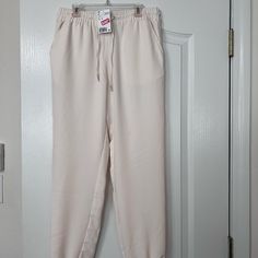 New Jogger Slacks From H&M Trendy H&m Spring Pants, H&m White Wide Leg Pants, H&m Tapered Leg Bottoms For Spring, H&m Tapered Leg Spring Bottoms, H&m White Casual Pants, H&m Casual White Pants, Casual White H&m Pants, Casual H&m Loungewear Pants, H&m Casual Loungewear Pants