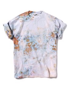 a white t - shirt with orange and blue dye on it