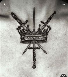 a man's chest with a crown and swords on it