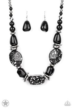 Chunky black beads with speckles of silver and a gorgeous glazed finish are threaded together with thick silver rings and smooth black beads. Features an adjustable clasp closure.

Sold as one individual necklace. Includes one pair of matching earrings.

Get The Complete Look!
Bracelet: "Glaze of Glory - Black" (sold separately) Thick Silver Rings, Thick Silver Ring, Jewelry Displays, Nickel Free Jewelry, Paparazzi Accessories, Black Necklace, Paparazzi Jewelry, Short Necklace, Necklace Earring Set