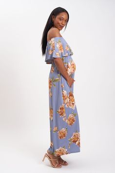 This sweet floral print with an off-the-shoulder ruffle is a comfortable and stylish maxi maternity dress. The dusty blue hue is perfect for any season, making this maternity dress an easy choice for all nine months of your pregnancy. This is a great maternity dress for your baby shower, gender reveal party, or a night out. Off-the-shoulder ruffle For Hot Mommy during pregnancy and beyond Fabric: 95% polyester, 5% spandex Packaged and shipped by our all-female owned and operated business. For si Off-shoulder Maternity Maxi Dress, Blue Maternity Maxi Dress, Spring Light Blue Off-shoulder Maxi Dress, Light Blue Off-shoulder Maxi Dress For Spring, Blue Maxi Length Maternity Dress, Flowy Off-shoulder Maternity Maxi Dress, Blue Floral Print Maternity Maxi Dress, Light Blue Maternity Summer Dress, Summer Maternity Light Blue Dress