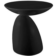 a black table with an oval top on it's pedestal, against a white background