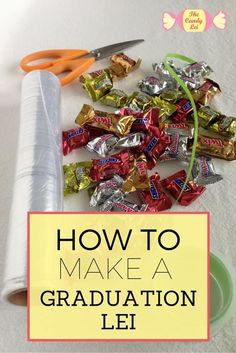 a pile of candy sitting on top of a table next to scissors