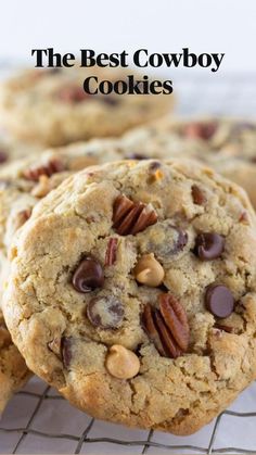 chocolate chip cookies with pecans and nuts on a cooling rack