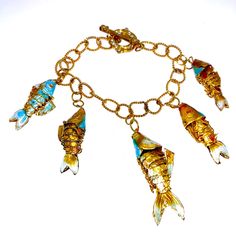 Unique Custom Bracelet Gold Chain With 5 Cloisonne Enamel Fish In Shades Of Gold And Blue. Adjustable, Fits 7” + Wrist. Koi (Living Jewels) Symbolize Prosperity, Success And Good Fortune. Fish Measure Approximately 35 And 50mm. Artistic Blue Metal Jewelry, Blue Wearable Art Bracelet, Blue Bracelet With Unique Variations, Artistic Blue Bracelet, Fortune Fish, Swarovski Pearls Bracelet, Silk Wrap Bracelets, Faux Leather Bracelets, Spoon Bracelet