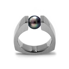 Bold triangular shaped ring with tension set semiprecious Black Pearl crafted in stainless steel. Ideal for men, but women love it too. Metal: stainless steel 316 tarnish free, Hypoallergenic Mounting: 6mm width, 3mm thick on the side, Comfort fit. Metal finish: brushed & polished Black Pearl size: 8mm (approx. 1.5 ct) * This ring will be specifically crafted for you, will ship in 1 to 2 weeks - Free USA shipping * NOTE: Prior placing the order, We strongly recommend having your ring finger size Modern Stainless Steel Ring For Formal Occasions, Modern Stainless Steel Ring For Formal Events, Modern Stainless Steel Jewelry For Anniversary, Modern Stainless Steel Ring Jewelry, Modern Trillion Cut Rings For Formal Occasions, Modern White Gold Trillion Cut Ring, Modern Stainless Steel Ring, Elegant Titanium Ring Jewelry, Modern Silver Trillion Cut Ring