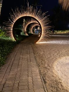 a pathway that has some lights on it