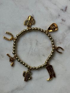 Western Cowgirl Beaded Charm Bracelet Adjustable Novelty Charm Bracelet, Adjustable Novelty Charms Bracelets, Casual Metal Charm Bracelet As Gift, Casual Metal Charm Bracelet For Gift, Casual Metal Charm Bracelet Gift, Adjustable Gold Casual Wristband, Adjustable Gold Wristband Casual Style, Casual Gold Stretch Bracelet For Gift, Casual Gold Stretch Bracelet Gift