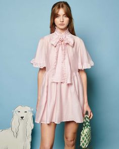 The Bertie Bow Mini Dress in baby pink organza is perfect for a romantic summer wedding guest attire. Featuring a loose fit with a grown-on necktie adorned with a ruffle edge and a big bow, it combines playful elegance with practicality, thanks to side pockets and a separate cami lining. The details- Main: 55% lyocell, Summer Wedding Guest Attire, Pastel Pink Dress, Romantic Summer Wedding, Bow Mini Dress, Wedding Guest Attire, Summer Wedding Guest, Romantic Summer, Baby Pink Colour, Summer Wedding Guests