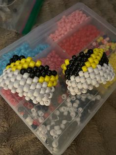 the beads are arranged in different colors and shapes to make them look like they are made out of legos