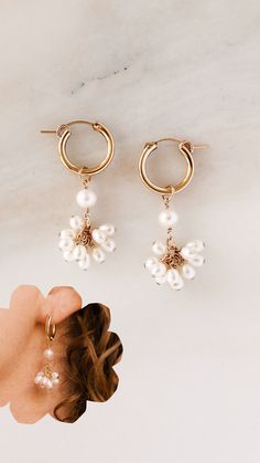 Inspired by the delicate charm of blossoming flowers, these iridescence PEARL BLOSSOM HOOP EARRINGS feature freshwater pearls individually hand wrapped and perfectly placed on to a pair of hoop earrings. Choose between gleaming gold or sleek sterling silver.

NOLIA jewelry is sustainably handcrafted to order in our Salt Lake City studio ✨ always FREE SHIPPING 💌 

#waterproofjewelry #hypoallergenicjewelry #sustainablejewelry #handcraftedjewelry #madeintheusa #pearlearrings #bridalearrings Delicate Hoop Jewelry With Flower Charm, Delicate Pearl Hoop Earrings With Pearl Charm, Delicate Pearl Huggie Hoop Earrings, Small Hoop 14k Gold-filled Pearl Earrings For Wedding, Small Hoop 14k Gold Filled Pearl Earrings For Wedding, 14k Gold-filled Small Hoop Pearl Earrings For Wedding, 14k Gold Filled Small Hoop Pearl Earrings For Wedding, Delicate Small Hoop Pearl Earrings With Pearl Charm, Delicate Dangle Hoop Earrings In 14k Gold Filled