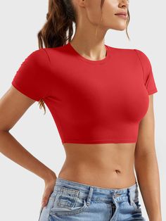 This adorable super-cropped top is designed to enhance your body proportions with a flattering fit. The double-layer lining ensures opacity, making it a versatile wardrobe essential for fitness, yoga, and casual outings.   Feature     Super Cropped Length  Short sleeve, breathability, and comfort  Double-lined, anti-see-through  Skin-friendly for body shaping  Versatile for any occasion     Fabric    73% Nylon + 27% Spandex    Model Measurements    Model Wear: S   Height: 173cm / 5'7"   Bust: 87 Casual Crop Top With Built-in Bra And Medium Support, Casual Solid Crop Top With Built-in Bra, Versatile Fitted Crop Top Activewear, Seamless Stretch Cropped T-shirt, Basic Solid Color Bra Friendly Tops, Basic Solid Color Tops, Bra-friendly, Fitted Solid Color Workout Tops, Basic Solid Bra Friendly Tops, Compressive Solid Tops Bra Friendly