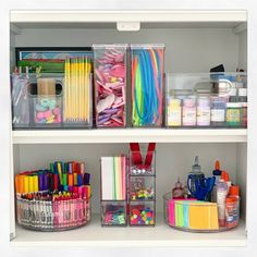 the shelves are filled with various craft supplies