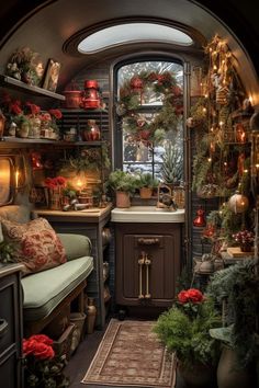 a small kitchen decorated for christmas with potted plants and wreaths on the windowsill