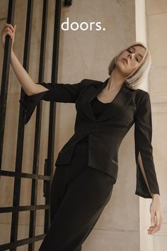 Carefully crafted in France, this sophisticated black tuxedo jacket features a relaxed cut with statement split sleeves. The oversized notched collar is trimmed with a decadent silk and leads down to a classic two-button fastening. Choose your normal size for a perfect fit, and team with the black trousers to indulge in a touch of elegant androgyny. Designed by GR LONDON PARIS an up-and-coming London-based Fashion House. Shop now at doors.nyc and #supportsmallbusiness Black Tuxedo Jacket, House Shop, Black Tuxedo, Tuxedo Jacket, Unique Clothing, Black Trousers, Notched Collar, Fashion House, Unique Outfits