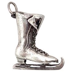 This lovely pendant of an ice skating lace up boot was made towards the end of the nineteenth century, a period when ice scating was a fashionable leisure activity. The beautifully modelled boot has been cast out of silver and finished by hand. just underneath the eyelet It is impressed just underneath the eyelet with the french crab mark for small silver articles. Silver Articles, Pendant Necklace Silver, Charm Necklace Silver, Charm Pendant Necklace, Ice Skating, Lace Up Boots, French Antiques, Silver Necklaces, Charm Pendant