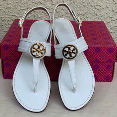 Brand New Tory Burch Selma Flat Slingback Thong Size 8 White Color Please Make Sure This Is Your Correct Size As This Is Final Sale No Return Or Exchange Accepted Thank You White Slingback Sandals With Branded Insole, Elegant Adjustable T-strap Slingback Sandals, Luxury White Slingback Sandals For Summer, White T-strap Sandals With Heel Strap, Designer T-strap Sandals For Summer, Black Tory Burch Sandals, Tory Burch Slides, Tory Burch Sandal, Sequin Sandals