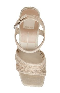 Stripes of imitation pearls and raffia alternate on the block heel and platform of this lofty sandal ready to make a statement. 4 1/4" heel; 1 1/2" platform (size 9) Adjustable ankle strap with buckle closure Textile upper/synthetic lining and sole Imported Cream Wedge Sandals With Platform And Open Heel, Cream Wedge Sandals With Heel Strap And Block Heel, Cream Wedge Sandals With Block Heel And Heel Strap, Cream Block Heel Wedge Sandals With Heel Strap, Chic Cream Wedge Sandals With Ankle Strap, Chic Beige Wedge Sandals With Heel Loop, Beige Platform Sandals With Block Heel, Chic Cream Ankle Strap Wedge Sandals, Cream Wedge Sandals With Platform And Block Heel