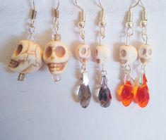 White skull earrings. Choose large skull or smaller skull with orange or grey drop. Each sold separately. Each sold separately. U.S. quarter is to show size of earrings. Beaded Halloween, Teal Pumpkin, Rabbit Earrings, Skull Beads, Small Skull, Halloween Beads, Pink Pumpkins, Bead Ideas, Beaded Skull