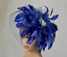 This headband is perfect for horse racing events, church, the Kentucky derby, weddings, garden tea parties and charity events. Please visit my other shop https://www.etsy.com/shop/BridalWorldAccessory?ref=hdr_shop_menu Thank you for shopping at my shop Have a great day Blue Headband Hat For Royal Ascot, Blue Headband Hat For Races, Blue Adjustable Fascinator For Gift, Blue Mini Hats As Summer Gifts, Blue Mini Hats As Gifts For Summer, Blue Headpiece For Kentucky Derby, Blue Headpieces For Kentucky Derby Races, Royal Blue Mini Hats For Royal Ascot Races, Elegant Blue Headband For Kentucky Derby