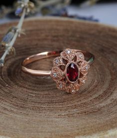 Ruby engagement ring 14k rose gold vintage oval cut Gypsy set | Etsy Exquisite Oval Ruby Wedding Ring, Exquisite Oval Ruby Ring For Wedding, Elegant Ruby Wedding Ring, Elegant Bezel-set Ruby Wedding Ring, Oval Rose Gold Ruby Ring With Rose Cut Diamonds, Elegant Ruby Ring With Bezel Setting For Wedding, Heirloom Rose Gold Oval Ruby Ring, Oval Rose Gold Ruby Ring For Wedding, Rose Gold Oval Ruby Ring For Wedding