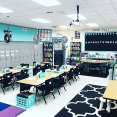 an empty classroom with desks and chairs