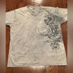 Shirt Is New Without Tag. Sz Xl. Color Is A Cream Gray Color. Gray Short Sleeve Shirt With Graphic Print, Graphic T Shirt, Gray Color, Graphic Tshirt, Tee Shirts, Mens Shirts, Man Shop, Cream, Grey