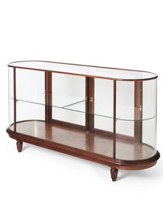 a wooden and glass display case sitting on top of a table