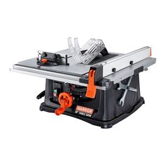 a table saw with an orange handle on it