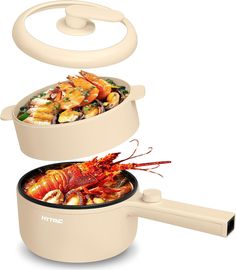 two pans filled with food sitting on top of each other