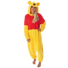 Winnie the Pooh is the all-time classic tale of Christopher Robin and his group of woodland friends from Hundred Acre Woods, Pooh Bear, Tigger, Piglet, Owl, and Eeyore. This Pooh Bear adult kigurumi pajama features a front zipper closure with an extremely baggy style to give it that Kigurumi costume look! The hood has a great 3D Winnie The Pooh face with high-quality embroidered details and puffy 3D ears. The whole Pooh pajama costume outfit is made of an ultra-soft fleece fabric that is 100% po Batman Costume For Boys, Pooh Onesie, Winnie The Pooh Face, Warm Halloween Costumes, Winnie The Pooh Costume, Jack Skellington Costume, Pajama Costume, Pajama Outfit, Winnie The Pooh Plush