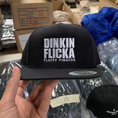 "Dinkin Flicka - Premium Snapback Hat Black The Dinkin Flicka Premium Snapback cap is sure to become your wardrobe staple with the classic snapback cap construct with premium wool-blend fabric. Match it with any attire for an elevated street style. * Classic snapback cap with premium wool blend fabric * Hard buckram. Structured * Matching plastic snapback closure * Classic green undervisor, 8-row stitching on visor Contents: 80% Acrylic / 20% Wool PROFILE: High VISOR: Flat PANELS: 6 CROWN: 3 ¾\" Elevated Street Style, The Office Quotes, Michael Scott Quotes, Office Quotes, Royal Colors, Funny Hats, Michael Scott, Dad Quotes, Snapback Cap