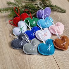 several heart shaped ornaments on a wooden table