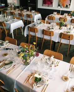 an image of a table setting with flowers and place settings on the front page of a website