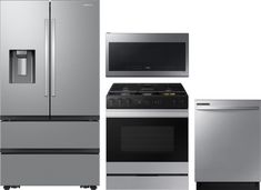 a silver refrigerator freezer sitting next to a stove top oven and an oven door