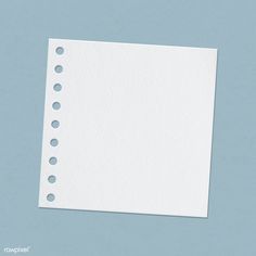 a piece of white paper with holes on it