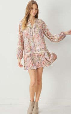 The sweetest dress silhouette. Featured in a mixed floral print design, a v-neckline, long sleeves, and trim detail throughout. This woven mini dress is lightweight and a must-have! Perfect for dressing up to an event or styling for every day with some fun earrings. blush floral print woven mini dress long sleeves lined trim detail throughout fits true to size 100% polyester Model is 5'10" and wearing size Small. Floral Print Design, Dress Long Sleeves, Dress Silhouette, Sweet Dress, Long Sleeve Mini, Trim Detail, Fun Earrings, Long Sleeve Mini Dress, Dress Long