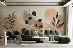 a modern living room with green couches and paintings on the wall