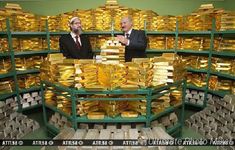 two men standing in front of stacks of gold bars