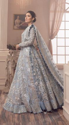 Introducing our Women's Premium Quality Pakistani Indian wedding bridal party dresses, perfect for mehndi, nikkah, engagement, reception, barat, walima, sangeet, mayu and everyday wear, available in all sizes, order now! a timeless piece crafted for those who appreciate classic style and superior craftsmanship. Inspired by the iconic design, these dress made in different style, lehenga, maxi, gown, sharara, saree, salwar kameez making it an essential addition to any wardrobe. Color:  Ice Blue Ma Walima Dresses Pakistani Brides Blue, Silver Bridal Dress, Dulhan Lehenga, Ethnic Aesthetic, Pearl Dresses, Pakistani Bridal Lehenga, Pakistani Lehenga, Lehenga Dress, Pakistani Bridal Dress