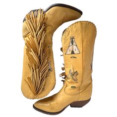 Rare Limited Edition Unique Hand Painted Vintage Zodiac Frontier Genuine Leatherwestern Southwestern Cowboy Boots Collectible Retro Size 6 Awesome Boots! Creamy Golden Tan Genuine Leather Uppers With Symbolic Western Designs. Thick Soft Lush Leather Fringe Top To Bottom Outer Leg Side Of Boot. Some Surface Wearvisible In Photos, None Of Which Effects The Boot Construction, Comfort, Wearability. These Boots Are Vintage. Shaft 12” Heel 4” Total Height 14” Tee Pee Native American Equestrian Chief Headress Horse Paint Pony Bow Arrow Chaps Cowboy Fringe, Western Designs, Vintage Zodiac, Tee Pee, Vintage Cowboy Boots, Bow Arrow, Golden Tan, Painted Pony, Fringe Top