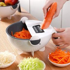 a person using a vegetable slicer to cut carrots