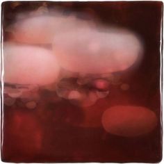 blurry photograph of red and white bubbles