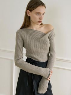 Editor's NoteOURCOMOS draws inspiration from the beautiful Lake Como in northern Italy, aiming to express deep and beautiful inner elements with a moody atmosphere.- Made of Merino wool and cashmere blended fabric- Vertically ribbed pattern- Comfortable and flexible fit- Unbalance boat neck design with one side off-shoulder- Contrasting color of trimming at the cuff- High-quality finish for durability- Classic and feminine moodMeasurements(in.)One Size- Shoulder: 14.17 in.- Chest: 13.39 in.- Hem: 12.60 in.- Sleeve: 5.12 in. (W) * 24.80 in. (L)- Cuff: 3.54 in.- Length: 21.65 in.*Model Info: Height: 5.74 ft. / Bust: 30 in. / Waist: 23 in. / Hips: 34 in.*The model is wearing ONE SIZE.Composition & Care- Material: Shell: 45% Nylon, 42% Polyester, 10% Merino Wool, 3% Cashmere- Dry clean rec Boat Neck Design, Summer Pullover, Mens Knit, Top Korean, Beautiful Sweater, W Concept, Northern Italy, Asymmetrical Tops, Beautiful Lakes