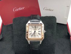 Cartier Santos Dumont for $6,190 for sale from a Seller on Chrono24 Cartier Formal Watches With Date Display, Elegant Cartier Watch With Date Display, Cartier Rectangular Dial Watch With Date Display, Cartier Watch With Rectangular Dial And Date Display, Cartier Watches With Date Display And Rectangular Dial, Cartier Black Watch For Anniversary, Black Cartier Watch For Anniversary, Luxury Cartier Watch With Date Display, Cartier Black Business Watch