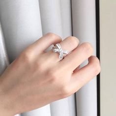 Material: Alloy Style: Celebrity street style Color: Bow ring White Diamond Open Ring With Metal Band, Trendy White Rings For Anniversary, Trendy White Open Ring, Trendy White Crystal Promise Ring, Trendy White Crystal Open Ring, Ribbon Ring, Ribbon Necklace, Bow Ring, Luxury Rings