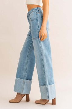 Step into timeless style with these High-Waisted Wide Leg Cuffed Jeans. The flattering high-rise silhouette elongates your legs, while the wide-leg cut adds a touch of retro sophistication. Complete with chic cuffed hems, these jeans seamlessly blend comfort and fashion Style: Casual Print / Pattern: Solid Silhouette: Wide Leg Jeans Fit: Relaxed Embellishment: Cuffed Length: Ankle Closure: Button Fabric Contents: 100% Cotton Stretch fabric Non-sheer fabric Imported High Cuffed Jeans, Cuffed Jeans, Leg Cuffs, European Summer, Relaxed Fit Jeans, Light Denim, Fashion Model, Sheer Fabrics, Print Pattern